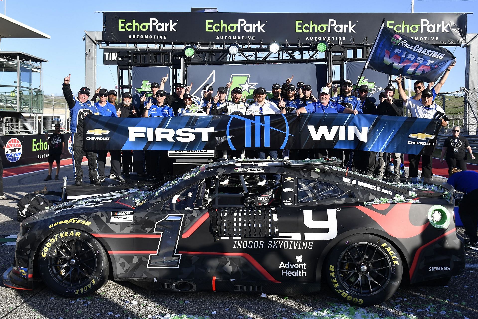 Ross Chastain and the Trackhouse Racing crew celebrate in victory lane after winning the 2022 NASCAR Cup Series Echopark Automotive Texas Grand Prix. (Photo by Logan Riely/Getty Images)