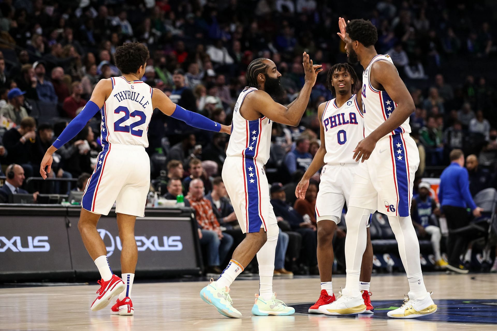 Enter caption Enter caption Matisse Thybulle, James Harden (second from left), Tyrese Maxey (0), and Joel Embiid (right) of the Philadelphia 76ers high five during a time out against the Minnesota Timberwolves on Feb. 25 in Minneapolis, Minnesota. The 76ers defeated the Timberwolves 133-102.