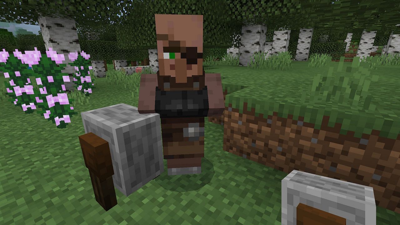 Placing a grindstone near an unemployed villager will create a weaponsmith villager (Image via Minecraft)