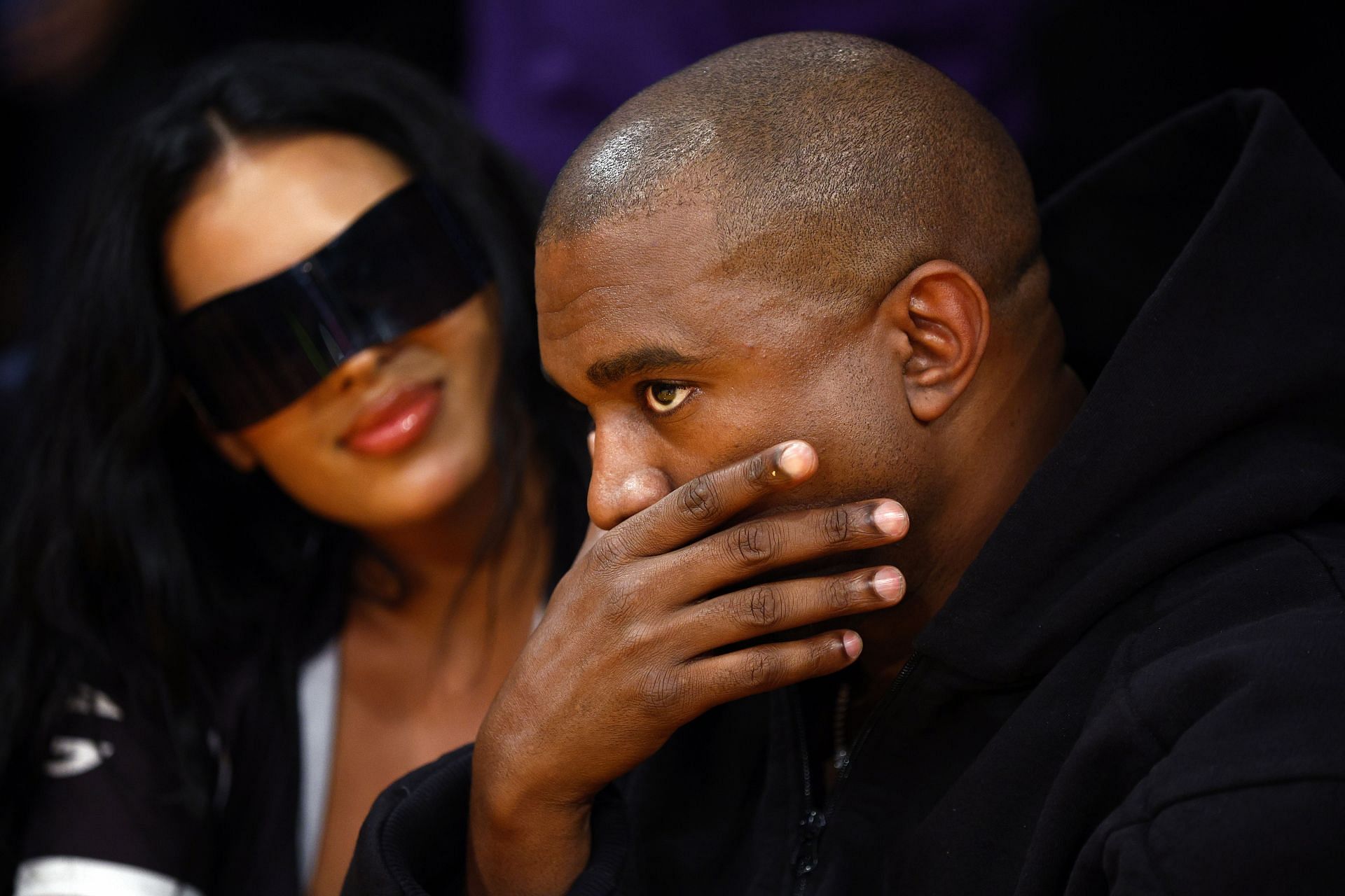 Kanye West attending a Los Angeles Lakers game