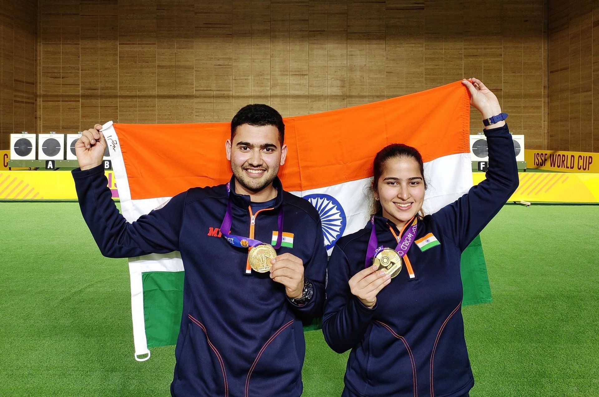 Anish Bhanwala and Rhythm Sangwan after winning Gold in 25m rapid fire pistol mixed event