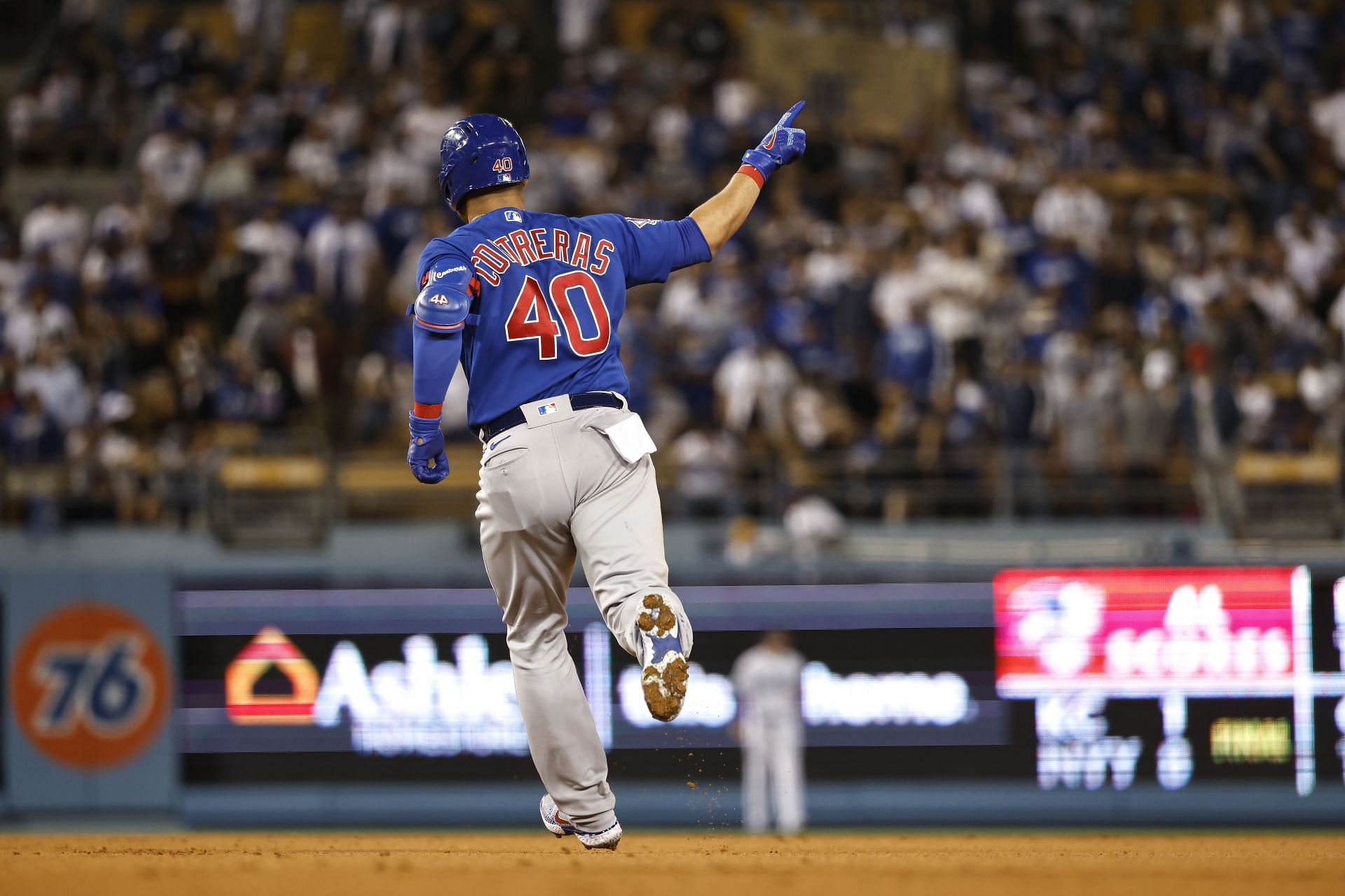 Contreras points to where he just hit his homer