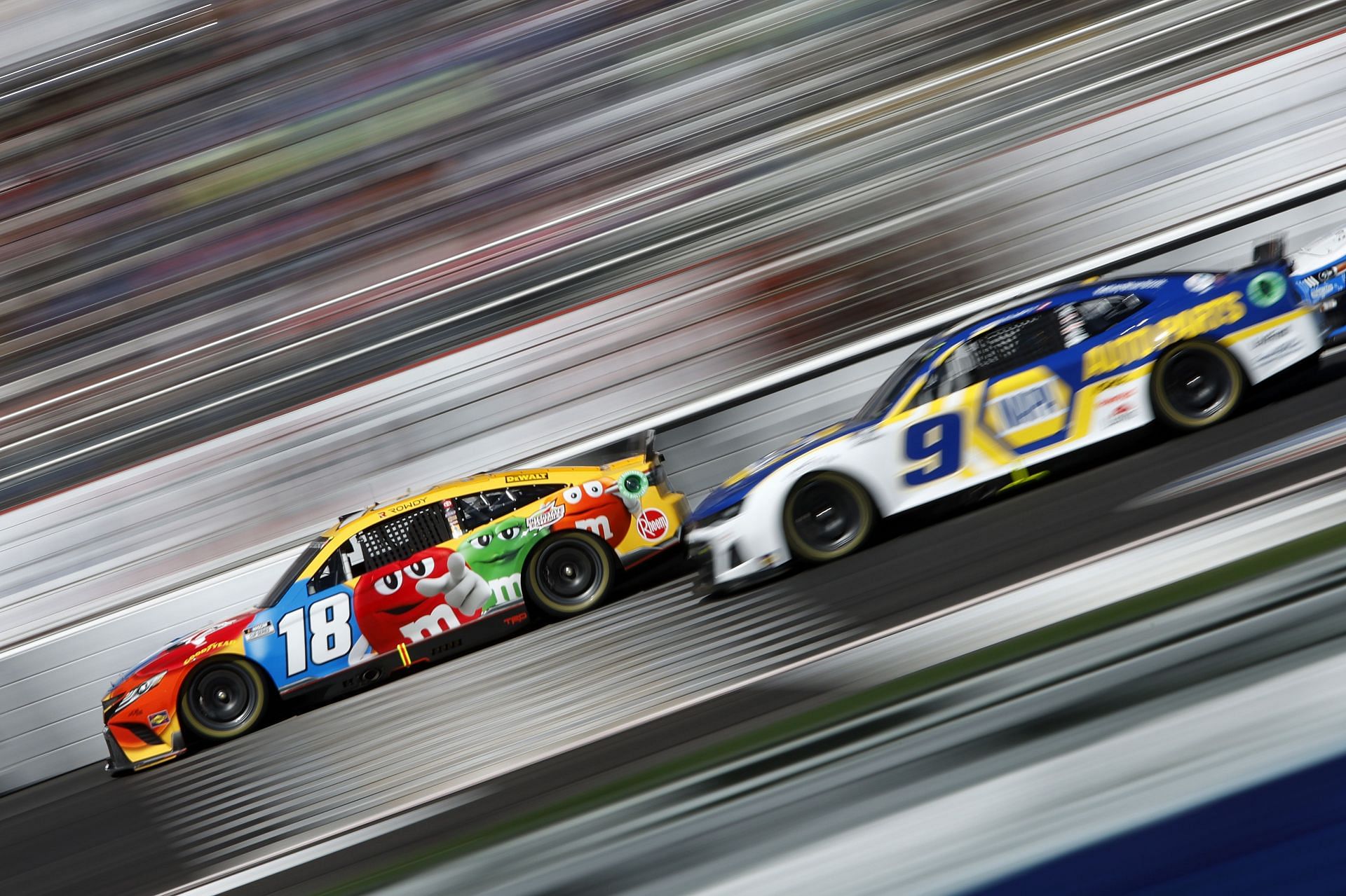 Chase Elliott (#9) chases Kyle Busch (#18) during the NASCAR Cup Series Folds of Honor QuikTrip 500 at Atlanta Motor Speedway in Hampton, Georgia (Photo by Sean Gardner/Getty Images)