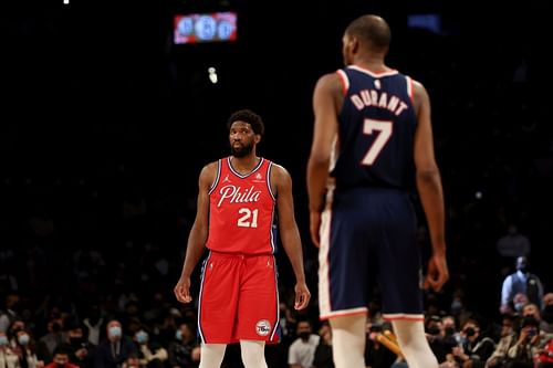 Joel Embiid and Kevin Durant in action during Philadelphia 76ers v Brooklyn Nets game