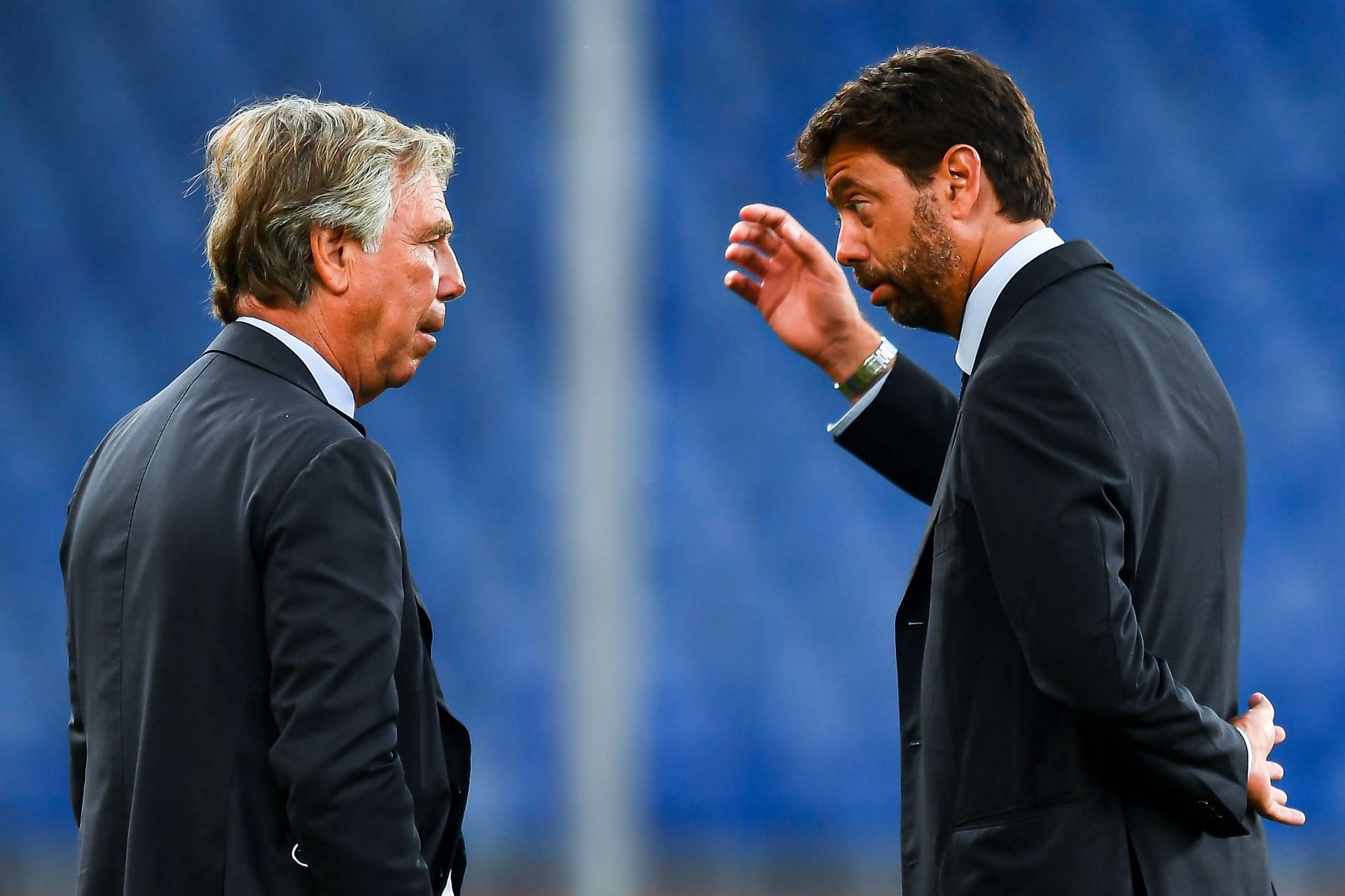 Andrea Agnelli chairman of Juventus (R) chats with Enrico Preziosi chairman of Genoa