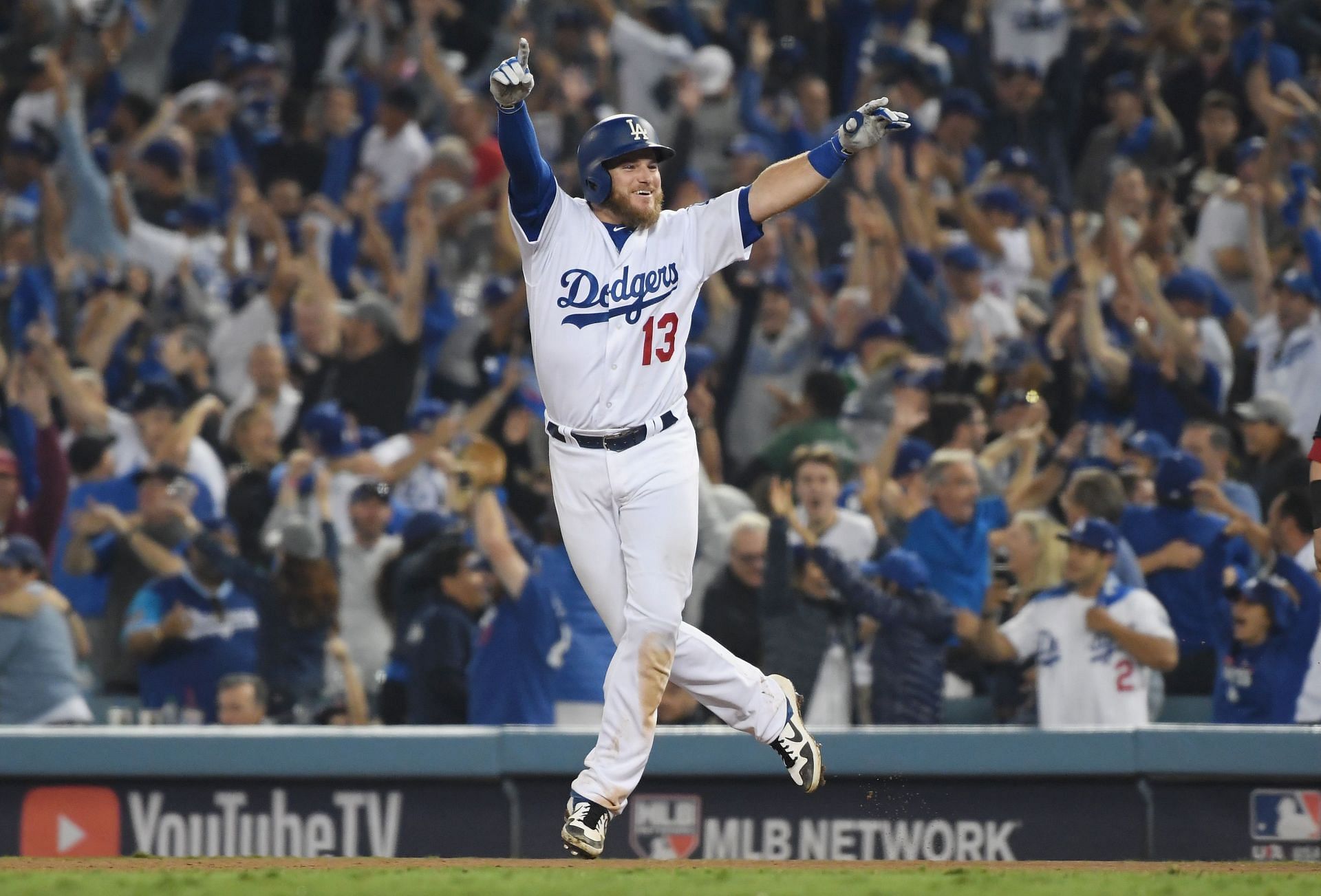 LA Dodgers IF Max Muncy celebrates his eighteenth inning walk-off home run to defeat the the Red Sox 3-2 in Game 3 of the 2018 World Series Championship at Dodger Stadium