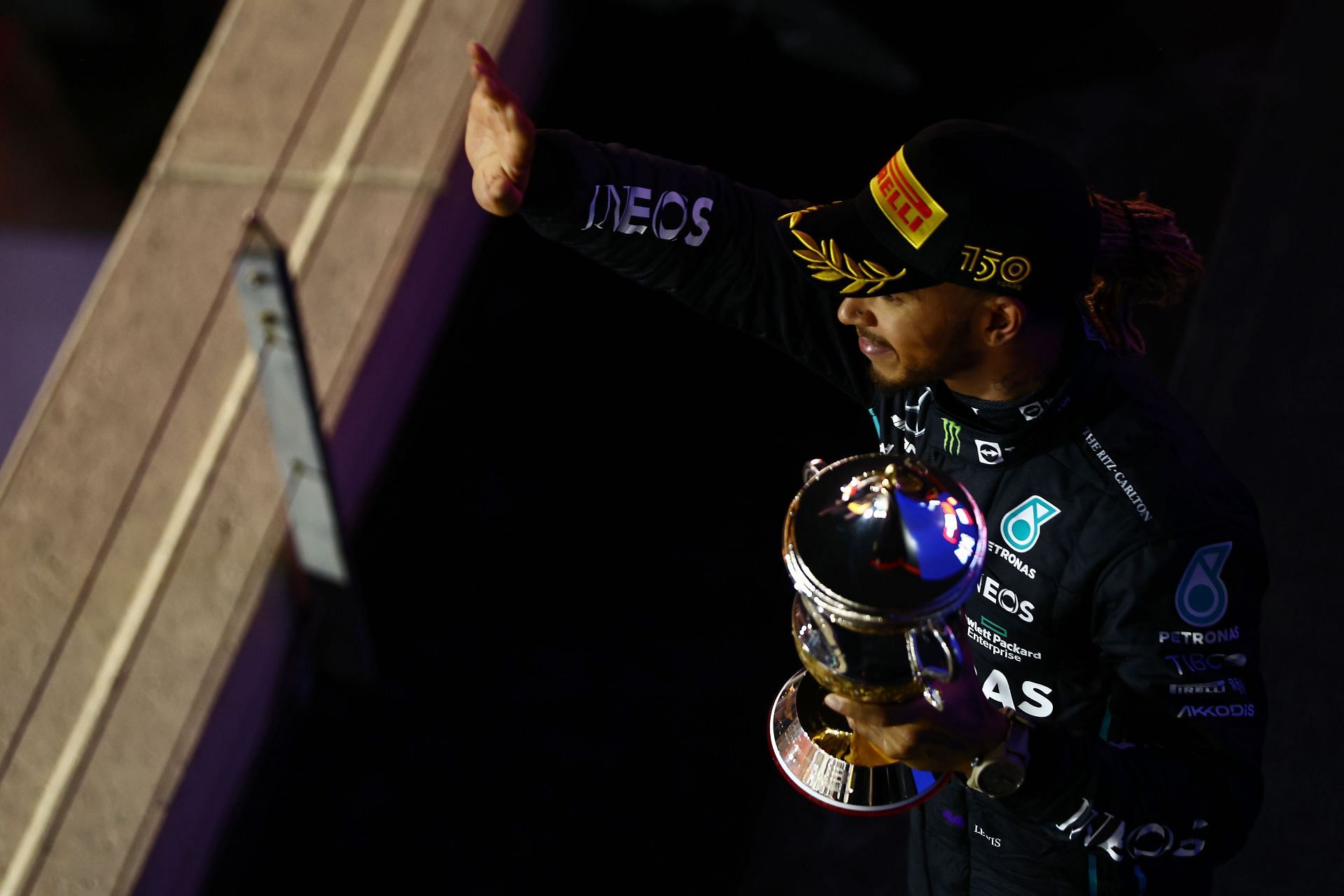 Lewis Hamilton celebrates on the podium during the F1 Grand Prix of Bahrain (Photo by Lars Baron/Getty Images)