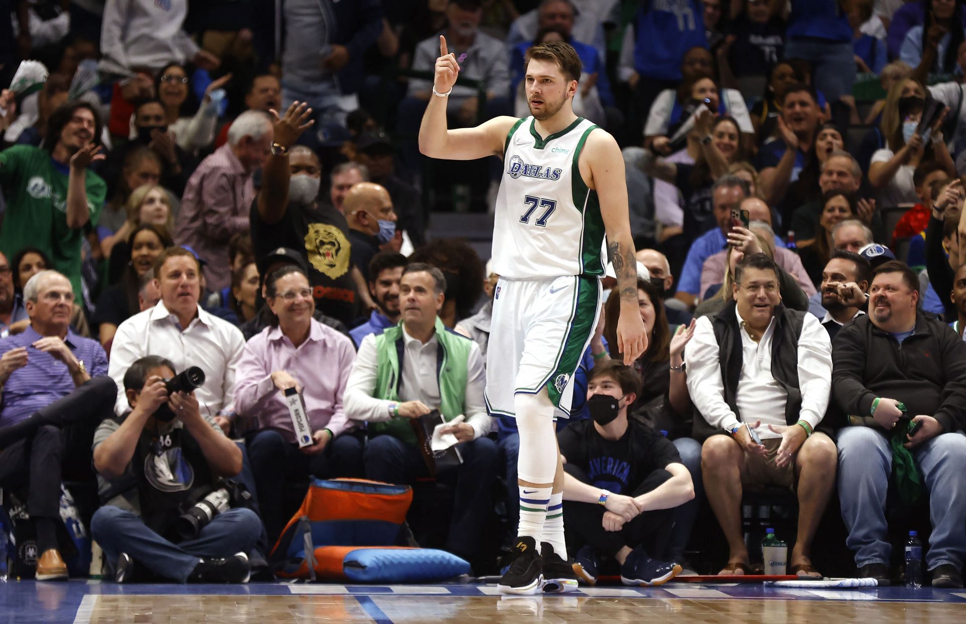 Luka Doncic #77 of the Dallas Mavericks reacts after scoring a basket against the Golden State Warriors in the first half at American Airlines Center on March 3, 2022 in Dallas, Texas.