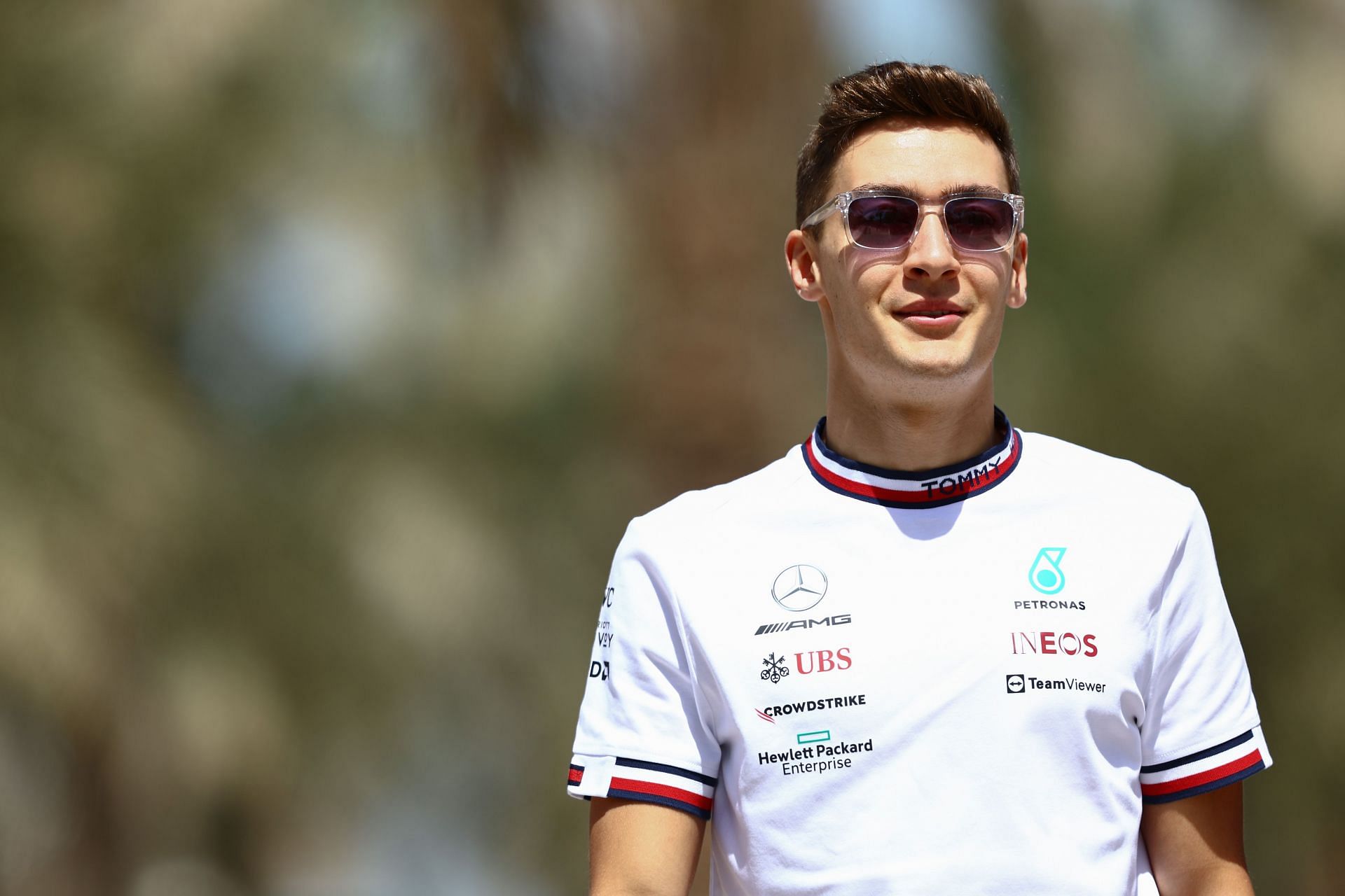 George Russell walks in the Paddock ahead of the practice in Bahrain (Photo by Mark Thompson/Getty Images)