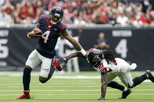 Deshaun Watson with a stiff arm against the Atlanta Falcons