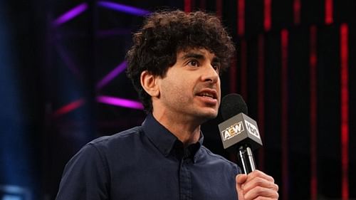 Tony Khan speaking at an AEW event in 2022.