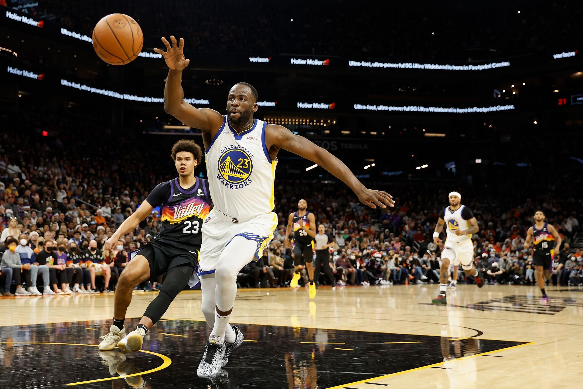 Draymond Green chases down a rebound