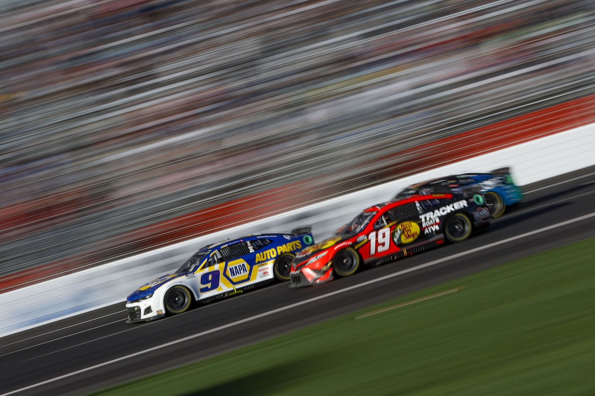 Chase Elliott and Martin Truex Jr. race during the 2022 NASCAR Cup Series Folds of Honor QuikTrip 500 at Atlanta Motor Speedway in Hampton, Georgia. (Photo by Sean Gardner/Getty Images)