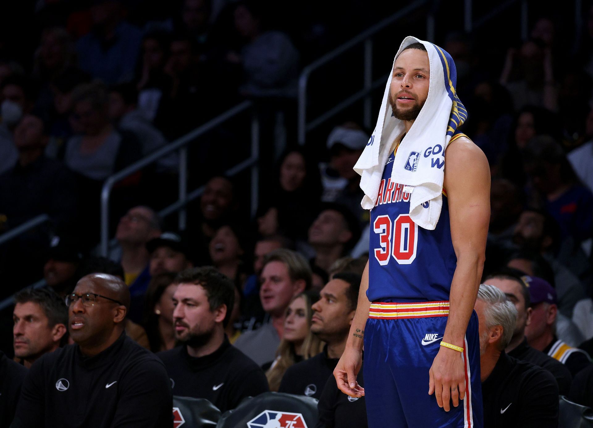 Steph Curry looks on at the Golden State Warriors game