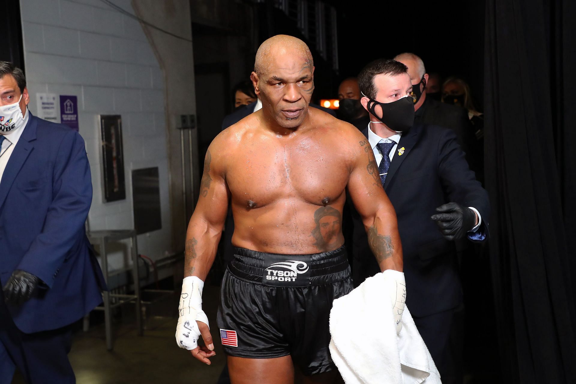 Mike Tyson (Center) is seemingly doing some reflecting upon his career on social media