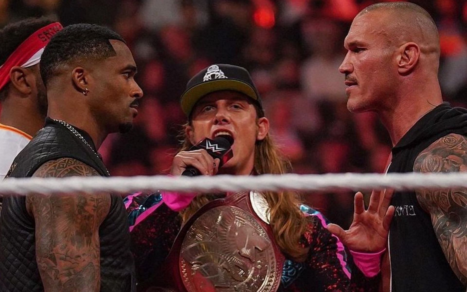 Randy Orton and Montez Ford stare off.