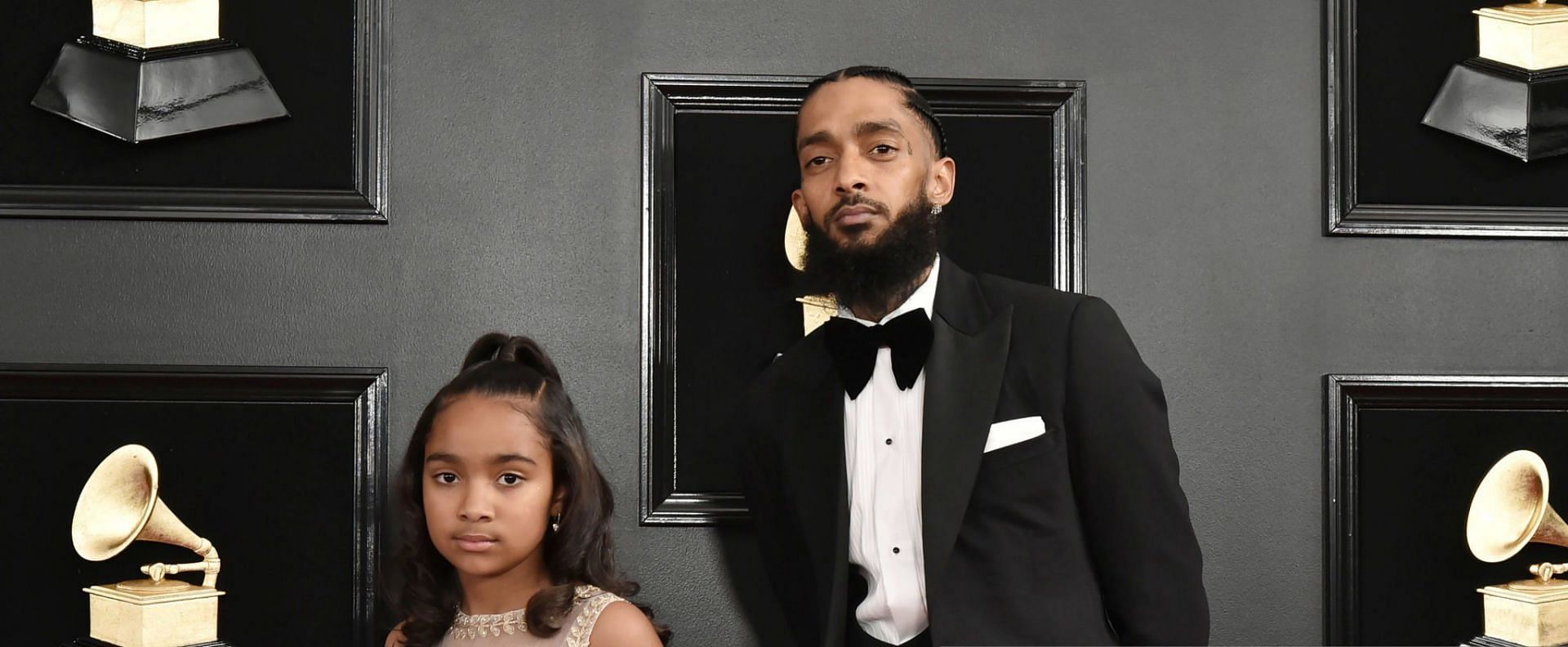 Nipsey Hussle&#039;s ex-partner and family members are embroiled in a custody battle over his daughter Emani Asghedom (Image via David Crotty/Getty Images) 