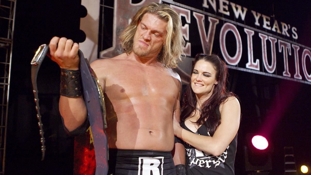 Edge celebrates his first WWE title
