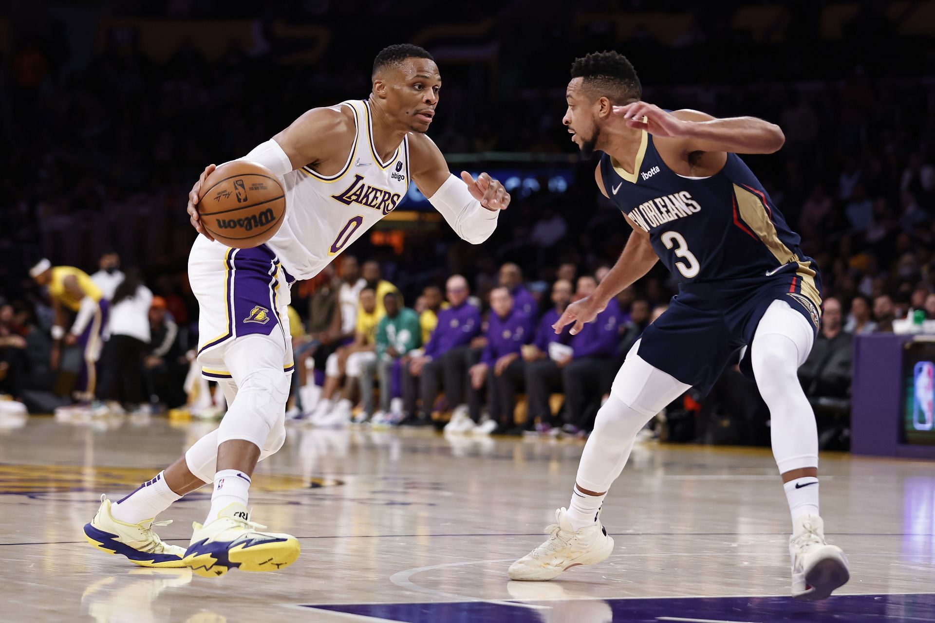 Russell Westbrook #0 of the Los Angeles Lakers drives against CJ McCollum #3 of the New Orleans Pelicans