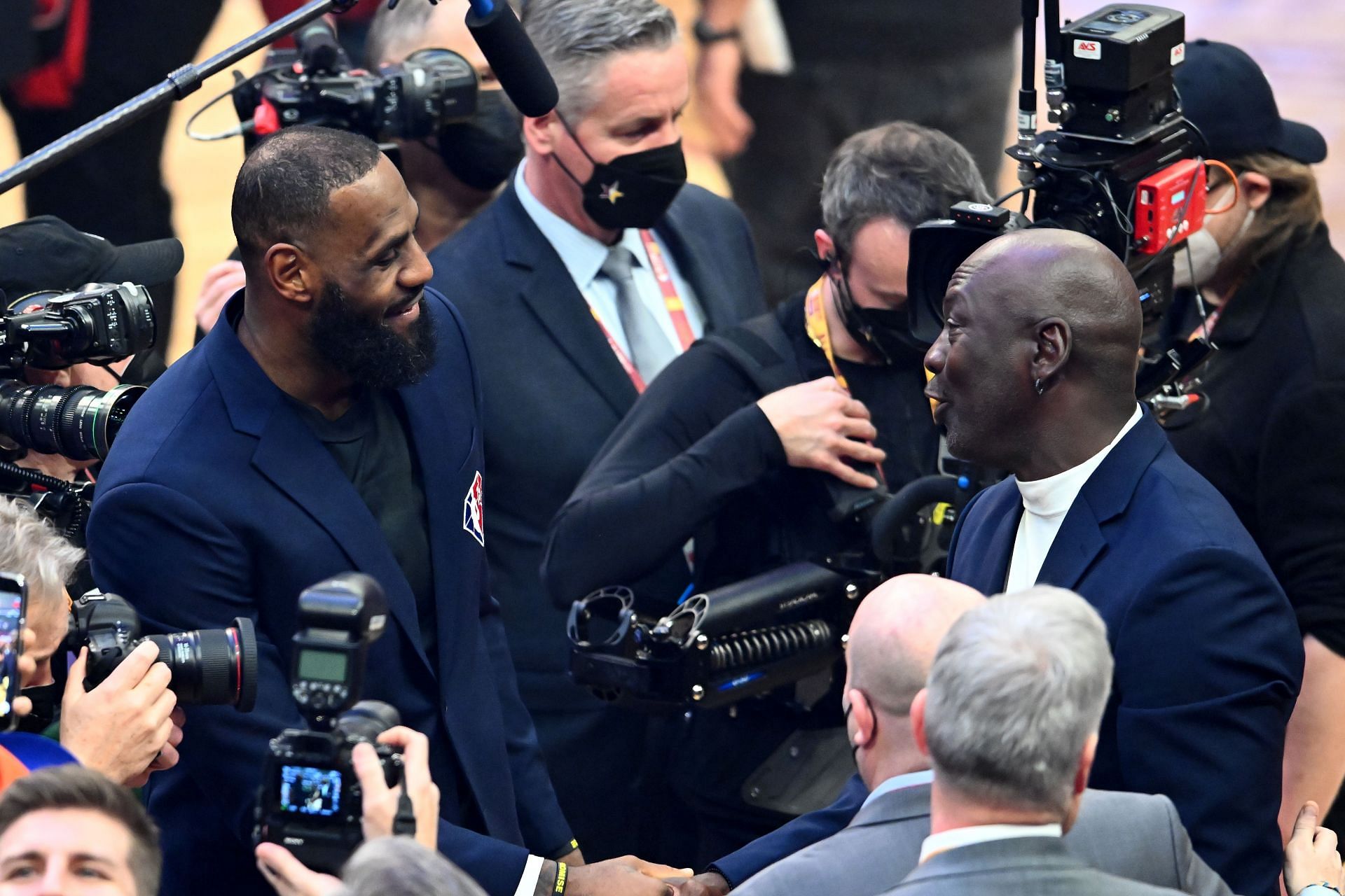 LeBron James and Michael Jordan greet each other during the 2022 NBA All-Star Game.