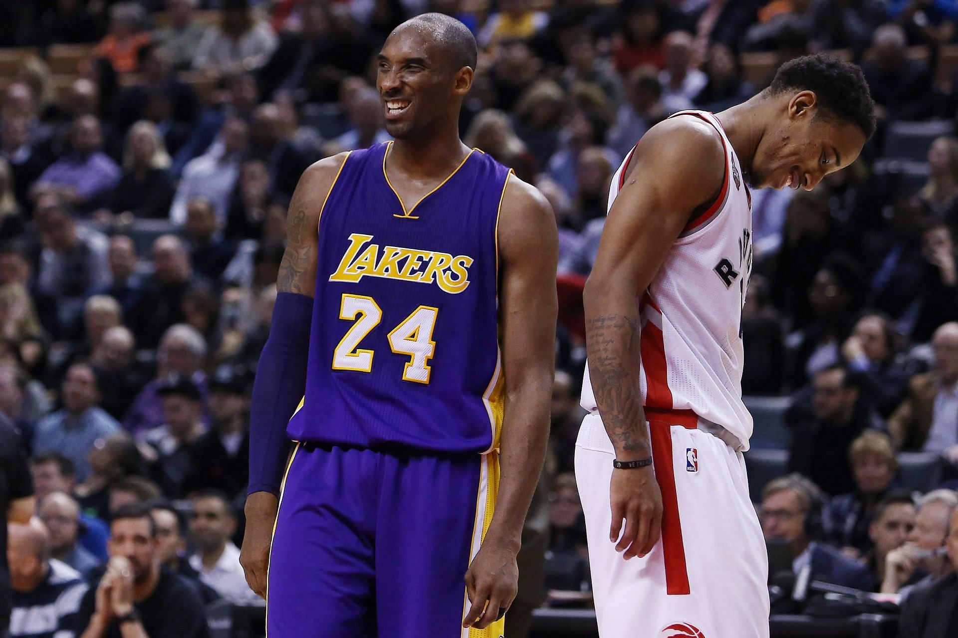 Lakers guard Kobe Bryant and Raptors guard DeMar DeRozan going against one another.