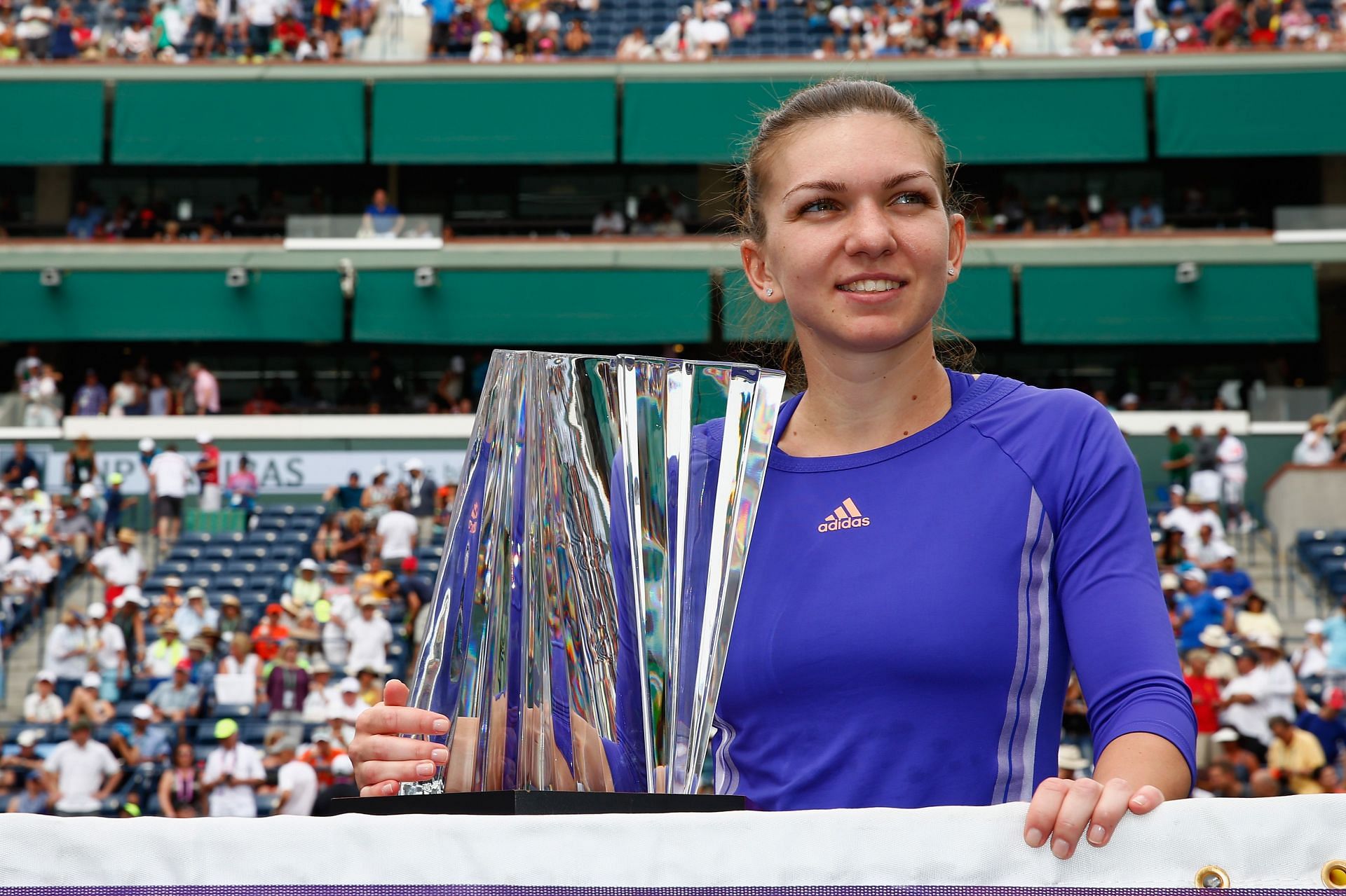 Simona Halep with the champions&#039; trophy after winning Indian Wells in 2015