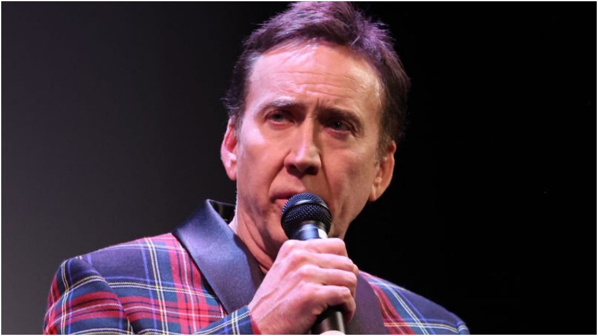 Nicolas Cage recently revealed how he paid off his debts (Image via Rich Fury/Getty Images)