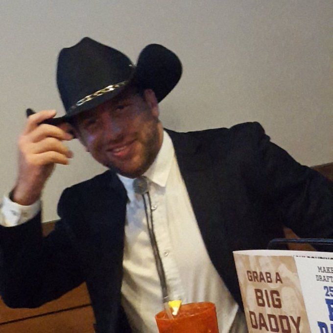 Kevin Owens calls out Drew Gulak's choice of cowboy hat on Twitter