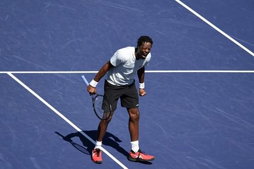 Gael Monfils celebrates after winning a point