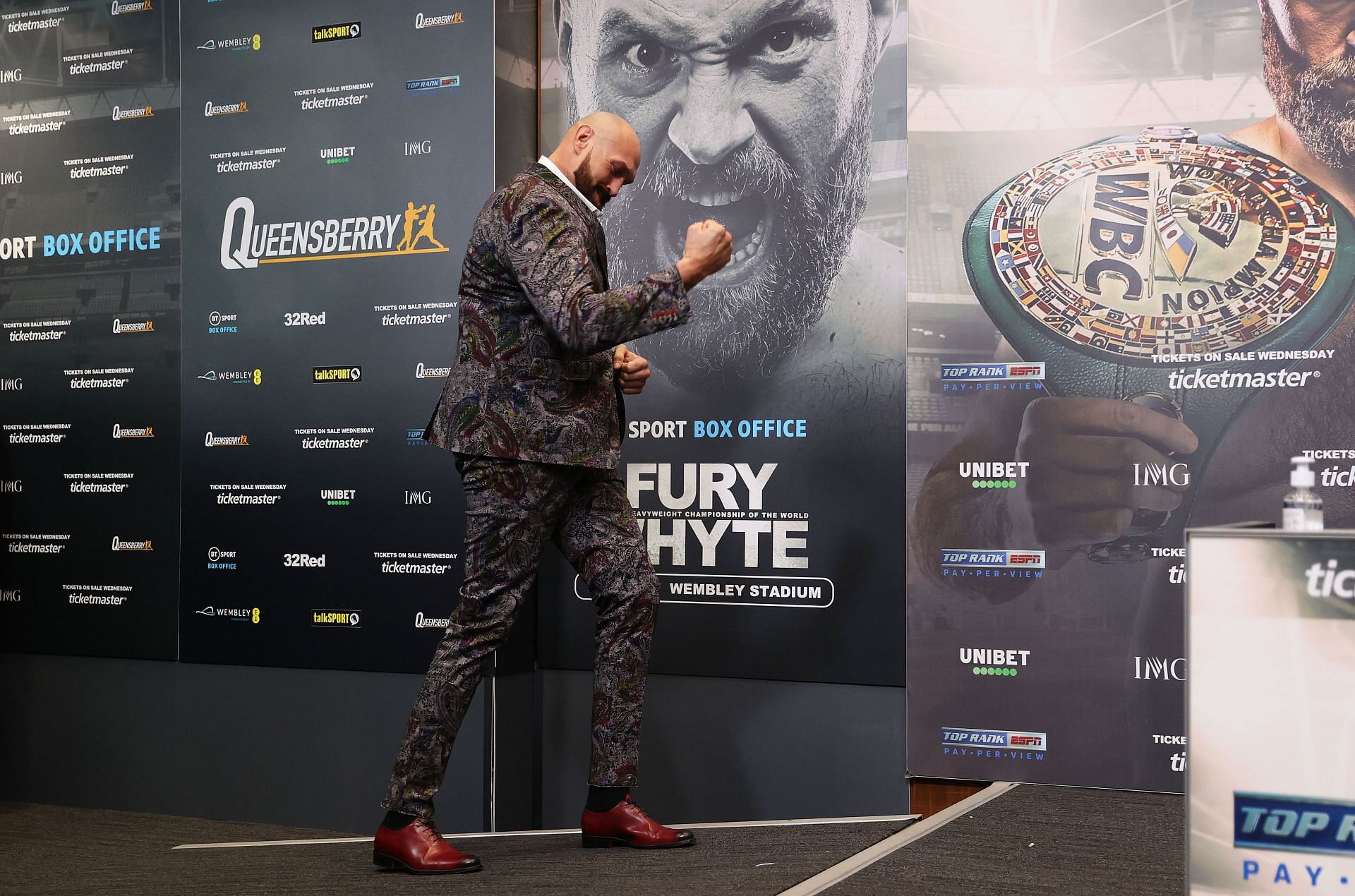Tyson Fury (center) announces he will retire after his next fight with Dillian Whyte