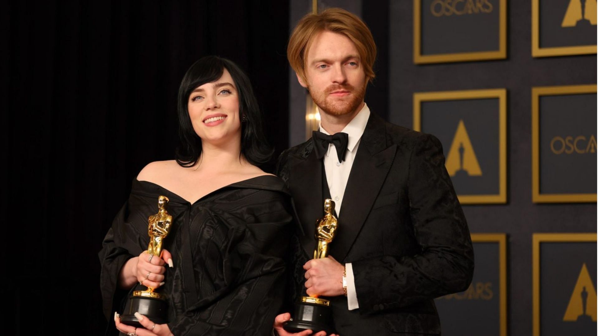 Billie Eilish and brother Finneas on Sunday won an Oscar for No Time to Die from the James Bond movie. (Image via Mike Coppola/Getty Images)