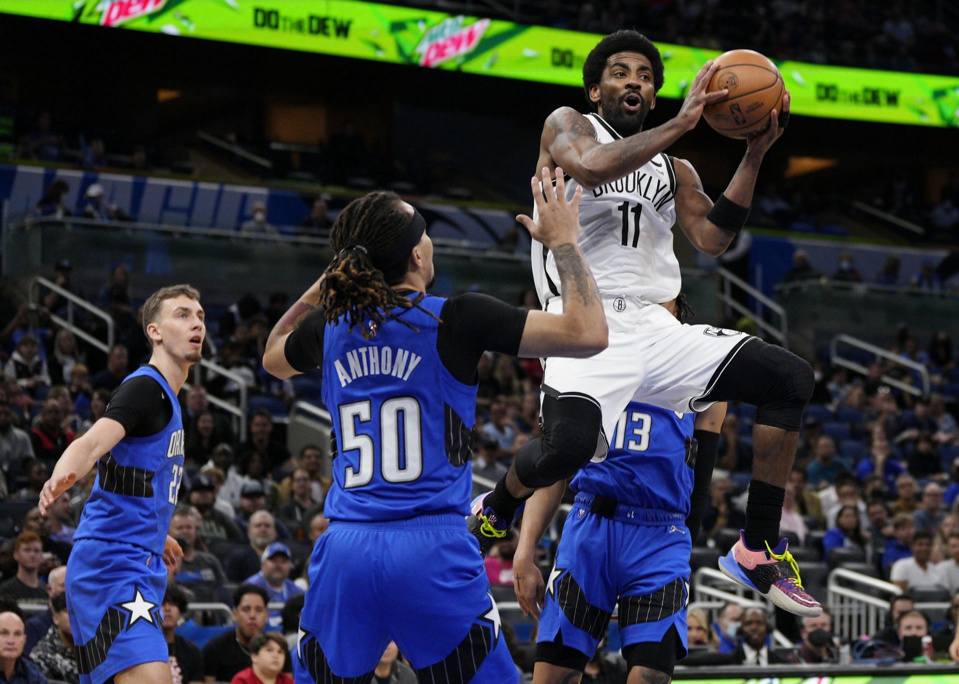 Kyrie Irving of the Brooklyn Nets drives against the Orlando Magic on March 15 in Orlando, Florida.