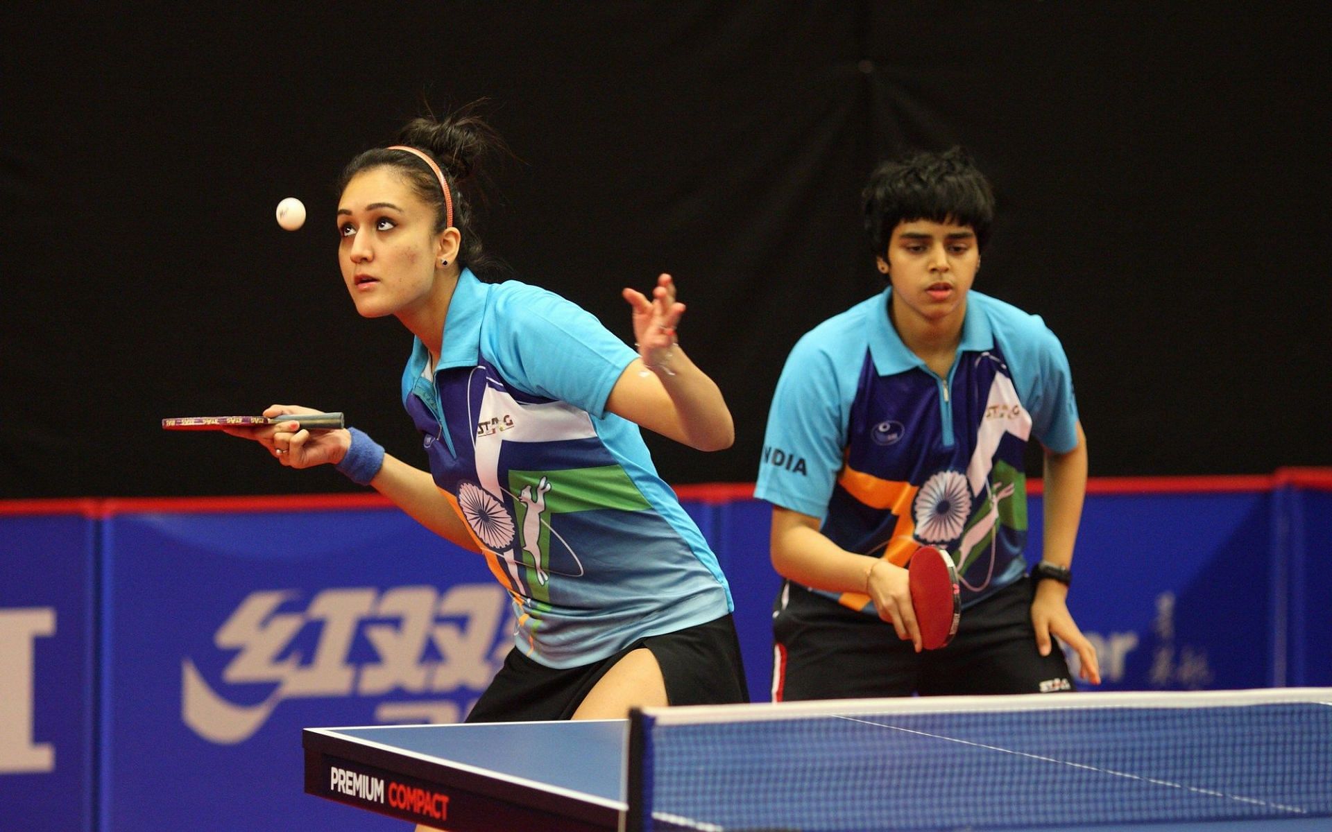 Indian table tennis players Manika Batra (L) and Archana Kamath in action. (PC: ITTF World)