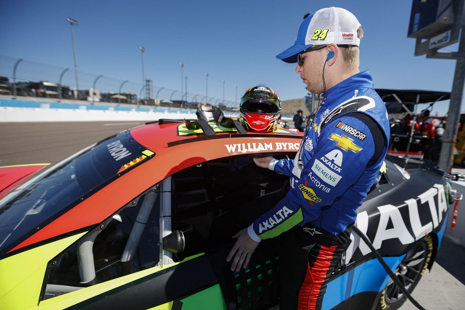 William Byron enters his car during practice for for the Ruoff Mortgage 500 at Phoenix Raceway. (Photo by Sean Gardner/Getty Images)