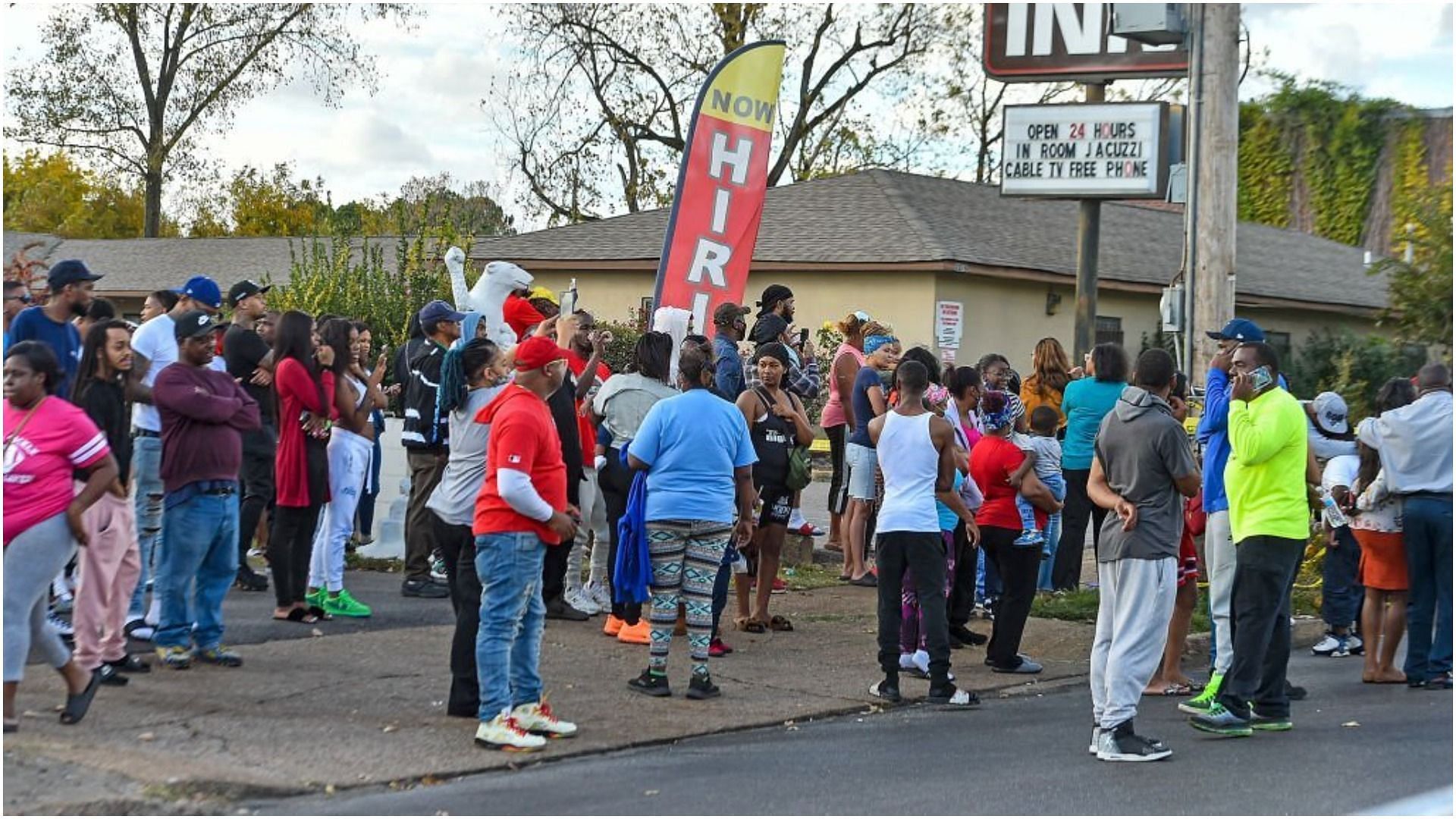 Crowds gather outside of Makeda&#039;s Cookies bakery after Dolph was shot and killed (Image via Justin Ford/Getty Images)