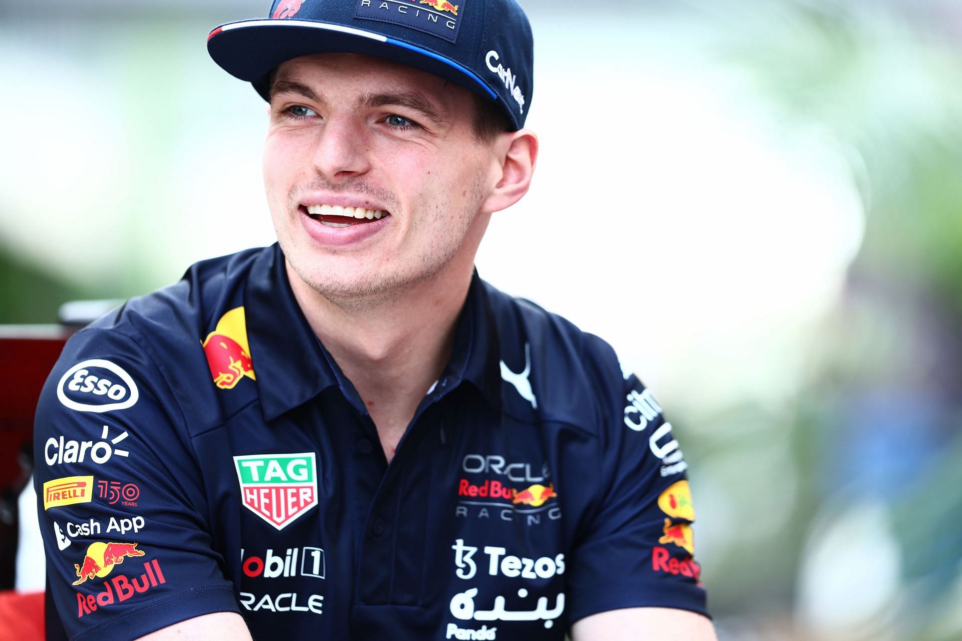 Max Verstappen smiles in the Paddock during previews ahead of the 2022 Saudi Arabian GP in Jeddah, Saudi Arabia. (Photo by Mark Thompson/Getty Images)