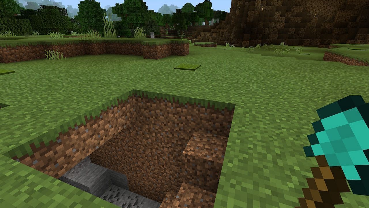 Digging straight down is an option, but it may not be the most effective secret base idea out there (Image via Minecraft)