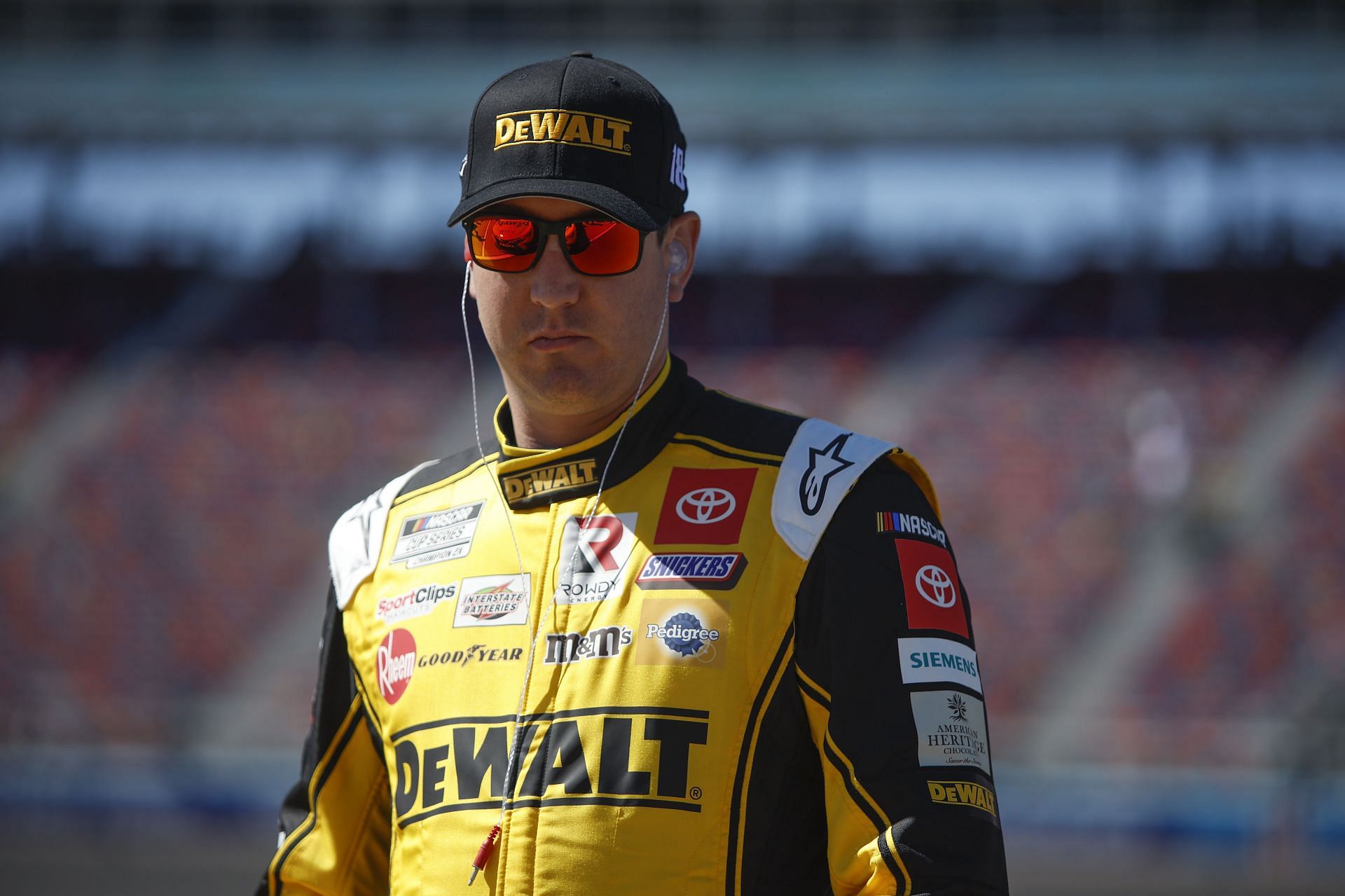 Kyle Busch waits on the grid during practice for the Ruoff Mortgage 500 at Phoenix Raceway (Photo by Sean Gardner/Getty Images)
