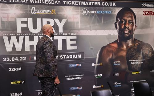 Tyson Fury (L) was forced to do a staredown with Dillian Whyte's poster after the latter no-showed