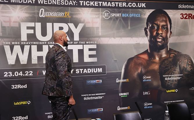 Watch: Tyson Fury does face-off with poster after Dillian Whyte no-shows presser