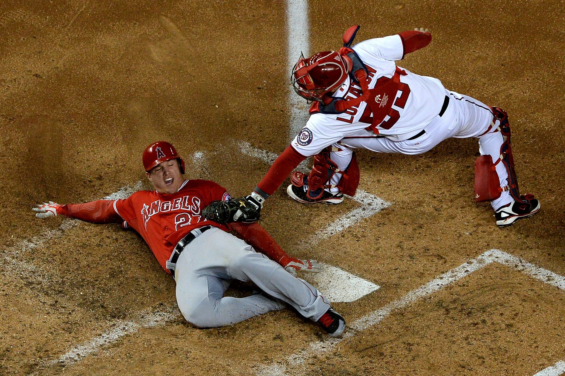 Mike Trout avoiding the tag at Home plate