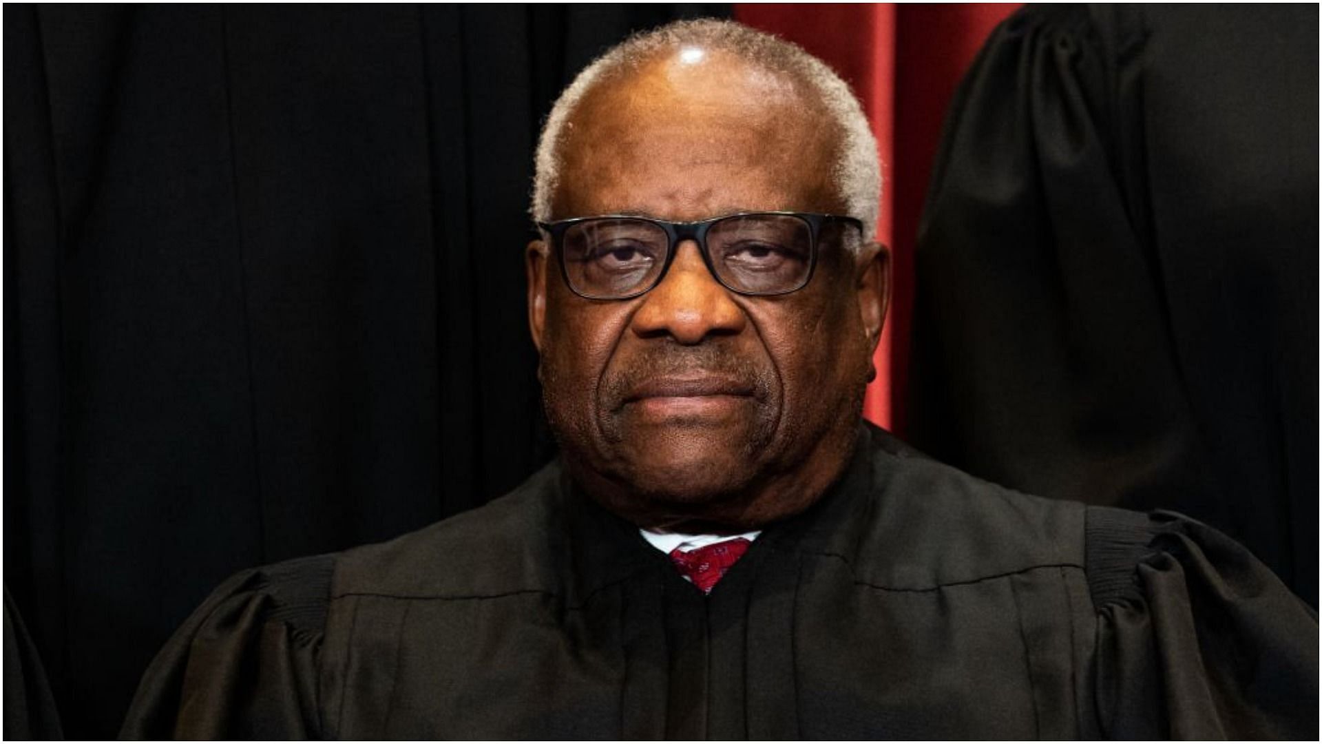 Justice Clarence Thomas in a group photo of the Supreme Court justices (Image via Getty Images/Erin Schaff-Pool)