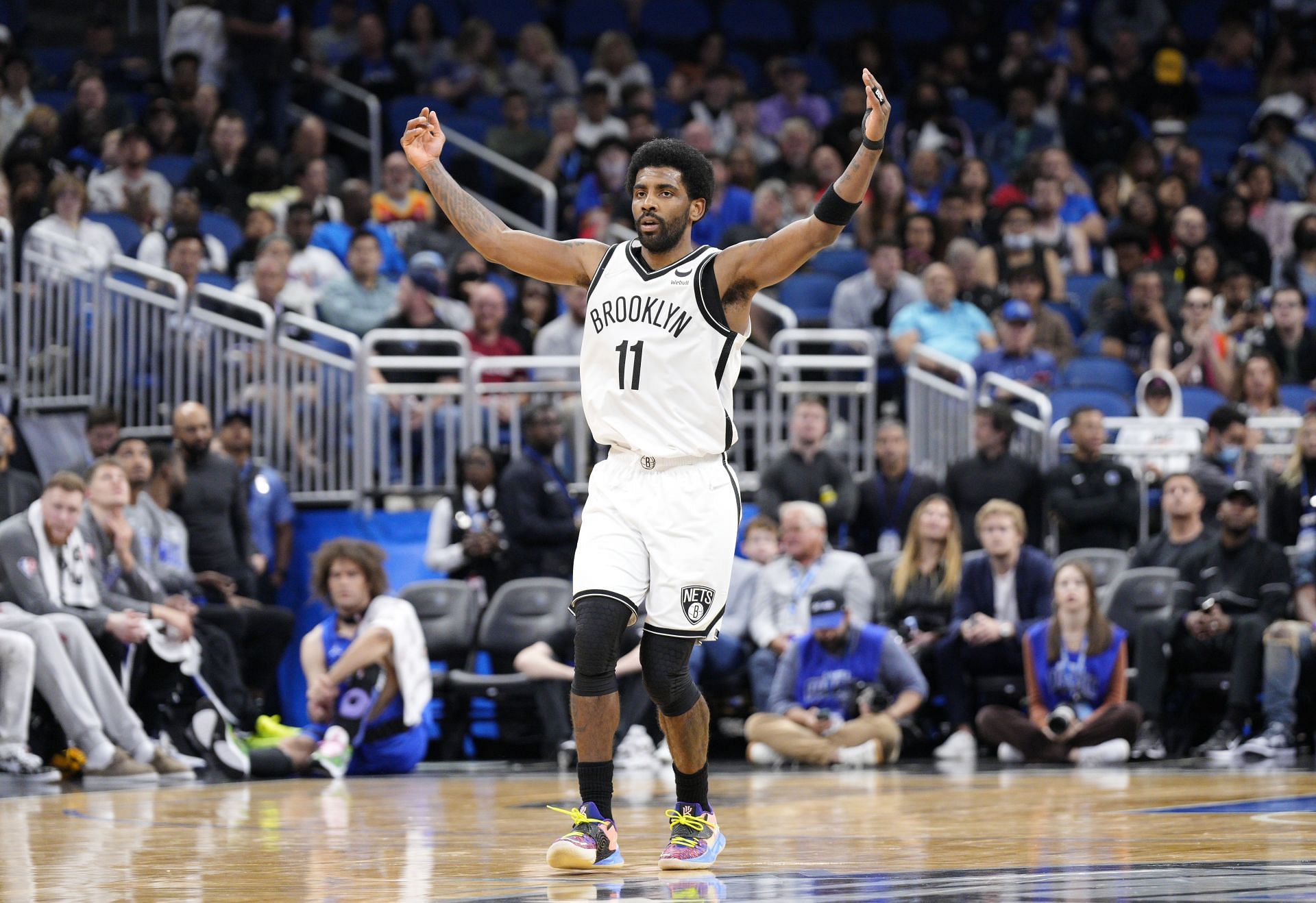 Kyrie Irving of the Brooklyn Nets celebrates after scoring against the Orlando Magic