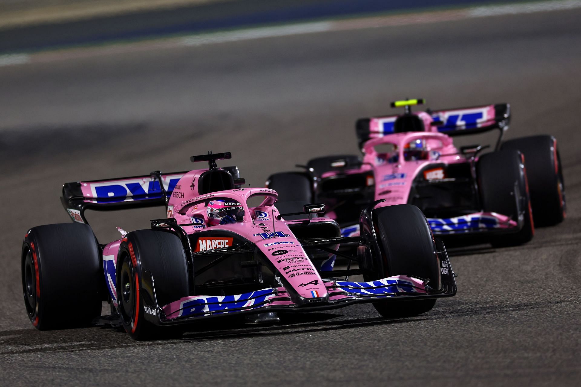 Fernando Alonso (foreground) leads Alpine teammate Esteban Ocon during the 2022 Bahrain GP (Photo by Lars Baron/Getty Images)