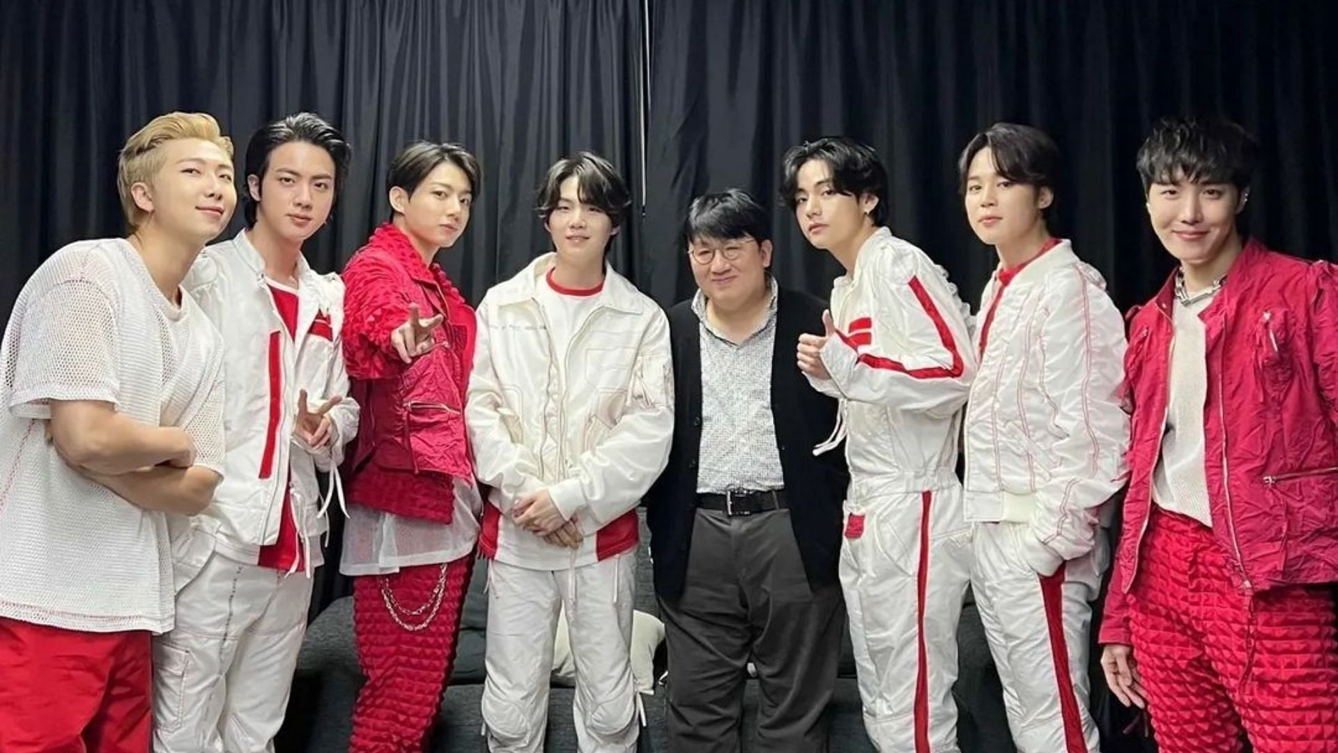 BTS with &quot;hitman&quot; Bang, founder of Big Hit Music and HYBE Corp post-Seoul concert (Image via @hitmanb72/Instagram)