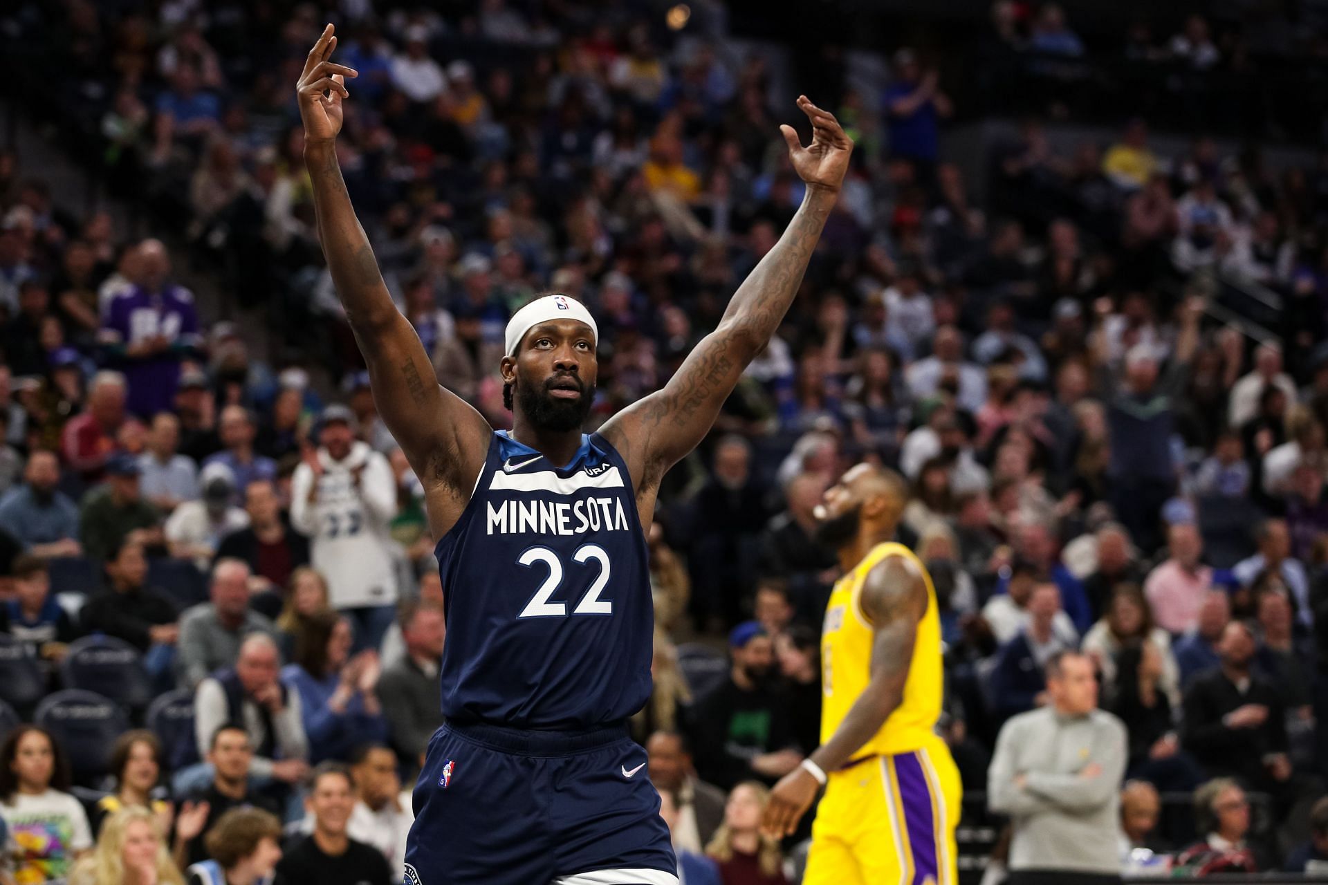 Patrick Beverley of the Minnesota Timberwolves celebrates after Anthony Edwards drew a foul while LeBron James of the LA Lakers reacts in the second quarter Wednesday in Minneapolis, Minnesota.