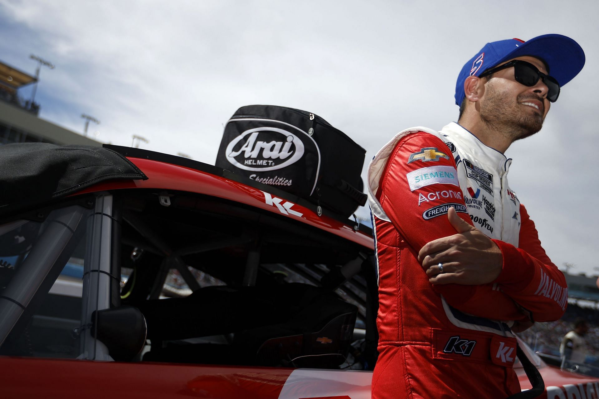 Kyle Larson, driver of the #5 Valvoline Chevrolet, stands on the grid before the Ruoff Mortgage 500 at Phoenix Raceway