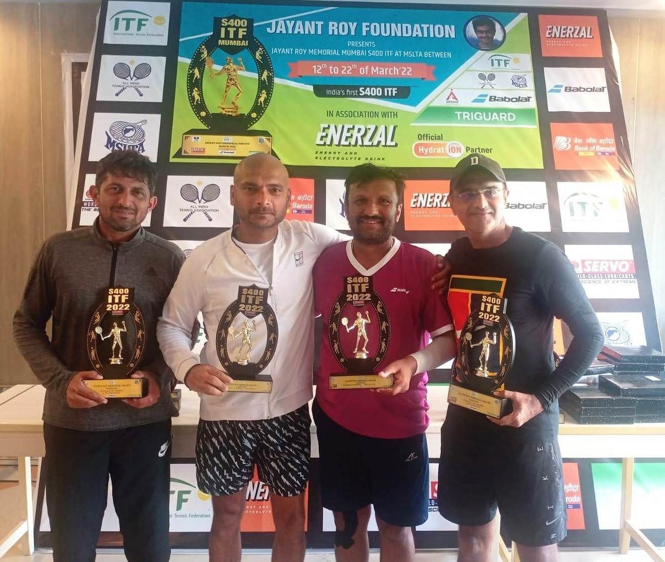 (L to R) Nitten Kirrtane, Nikhil Rao, winners of the 45 plus doubles, with opponents Yati Gujarathi and Himanshu Bhatia in Mumbai on Wednesday. (Pic credit: MSLTA)