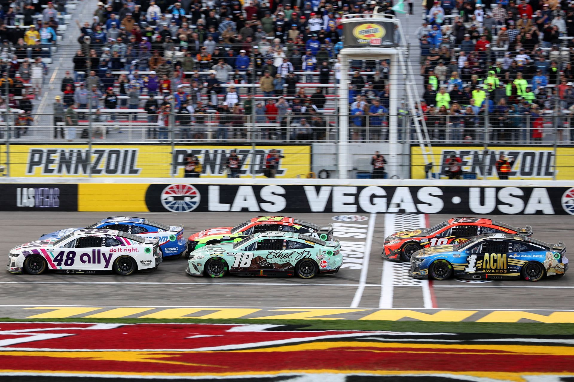 The Next Gen cars race during the NASCAR Cup Series Pennzoil 400 at Las Vegas Motor Speedway.