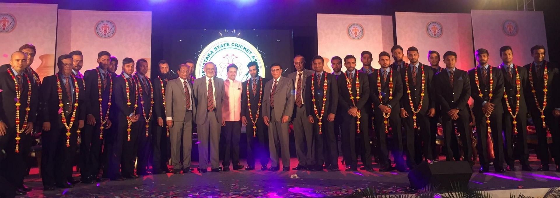 Karnataka Ranji Trophy team being felicitated after winning the Ranji Trophy two years in a row, in 2014-15 (Image: Twitter/Anurag Thakur)